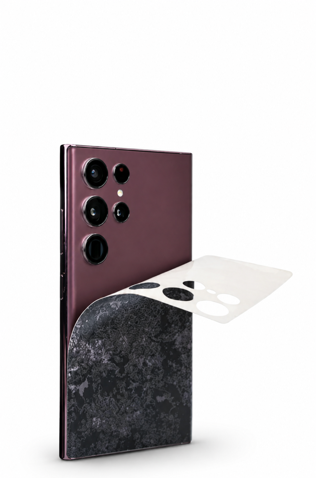 A skin being peeled back from the corner of a phone, leaving no residue